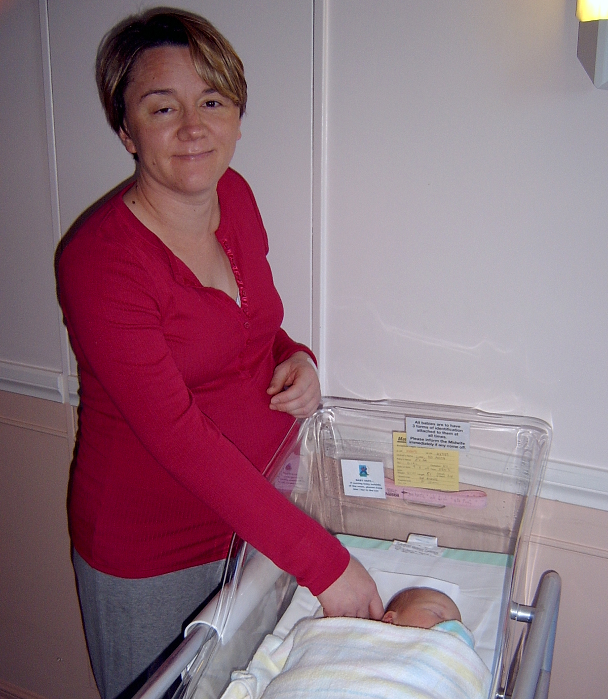 Anita in hospital, with her new baby